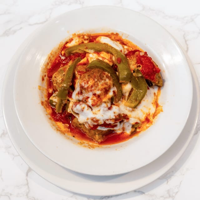 3 Meatballs with Peppers and Cheese.