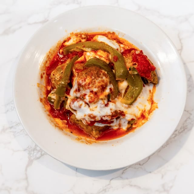 3 Meatballs with Peppers and Cheese.